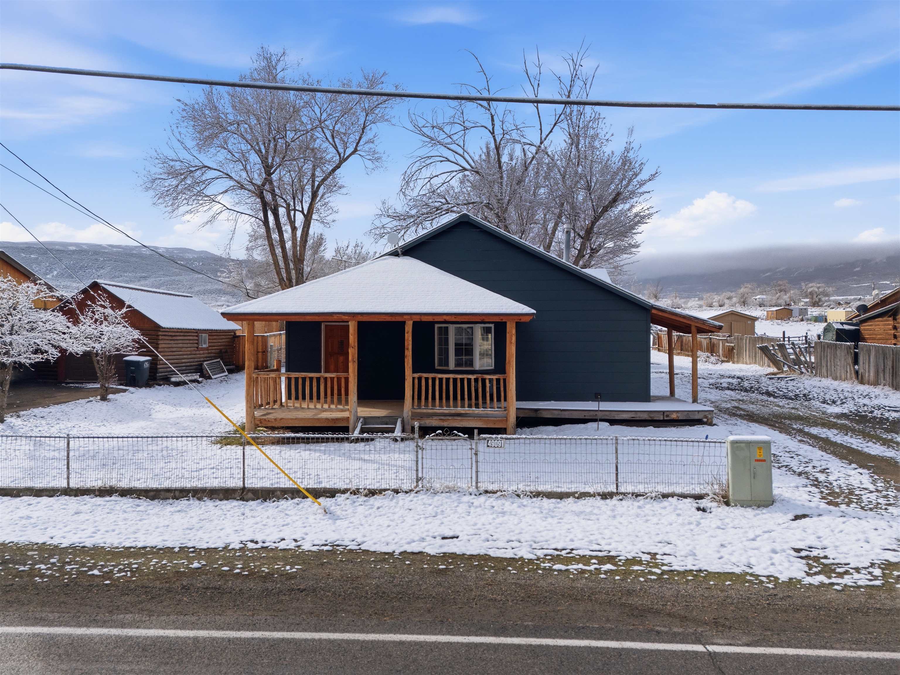 49091 KE Road Mesa, CO 81643 - Photo 3 of 29 a house with a outdoor space