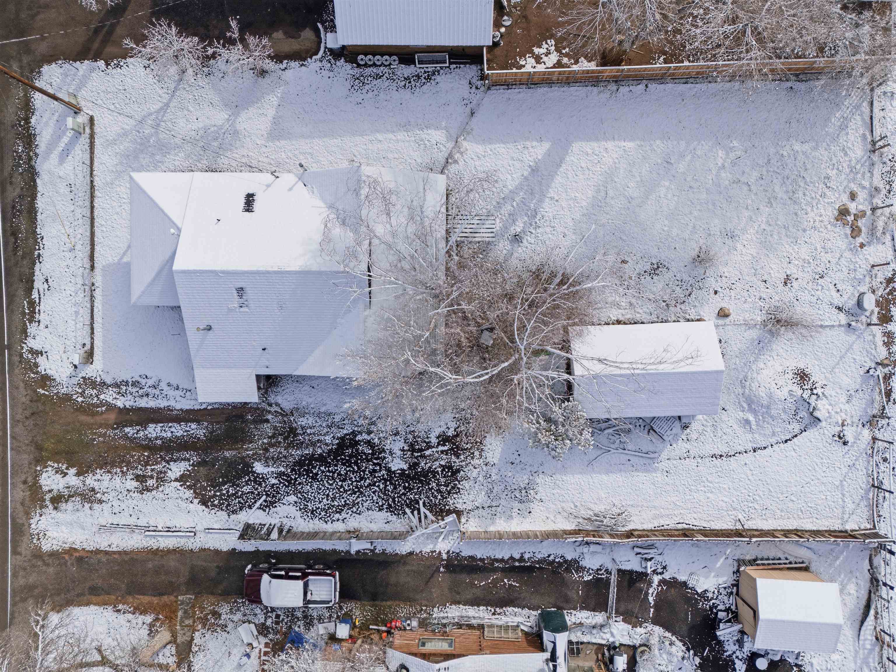 49091 KE Road Mesa, CO 81643 - Photo 7 of 29 an aerial view of residential houses with outdoor space