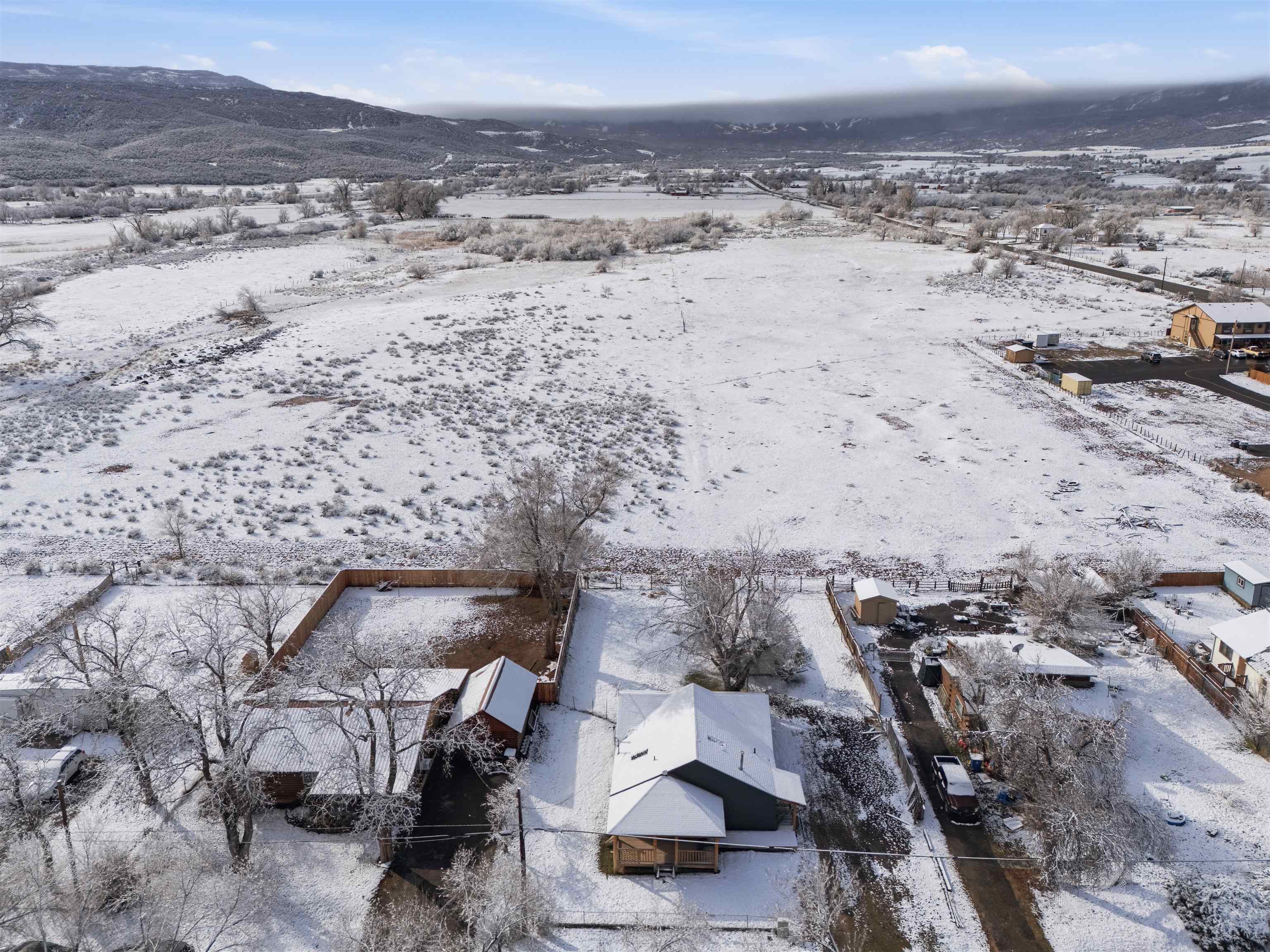 49091 KE Road Mesa, CO 81643 - Photo 9 of 29 a view of roof and mountain view