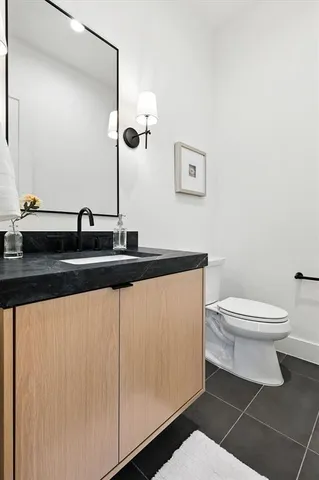 a bathroom with a sink and a toilet