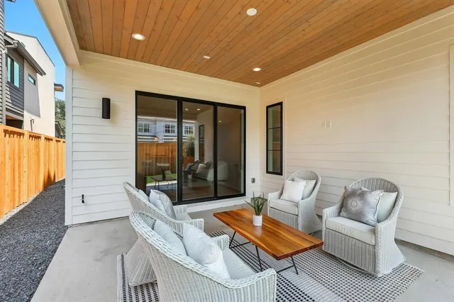 a outdoor space with patio couch and a couch