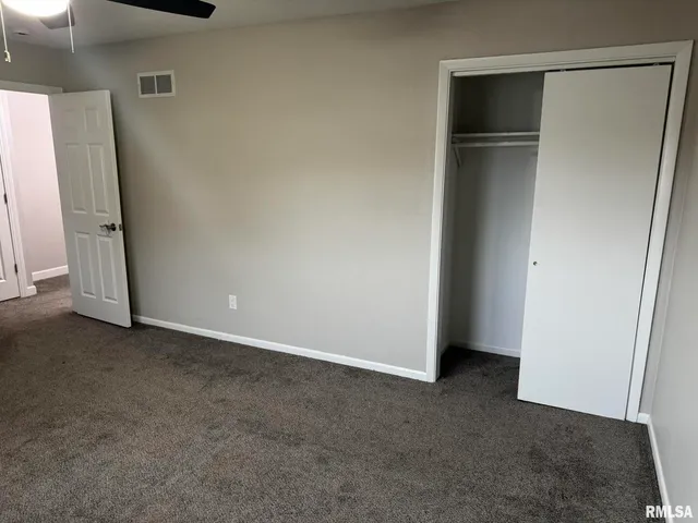 an empty room with closet