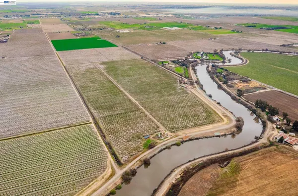 a view of a swimming pool with a terrace