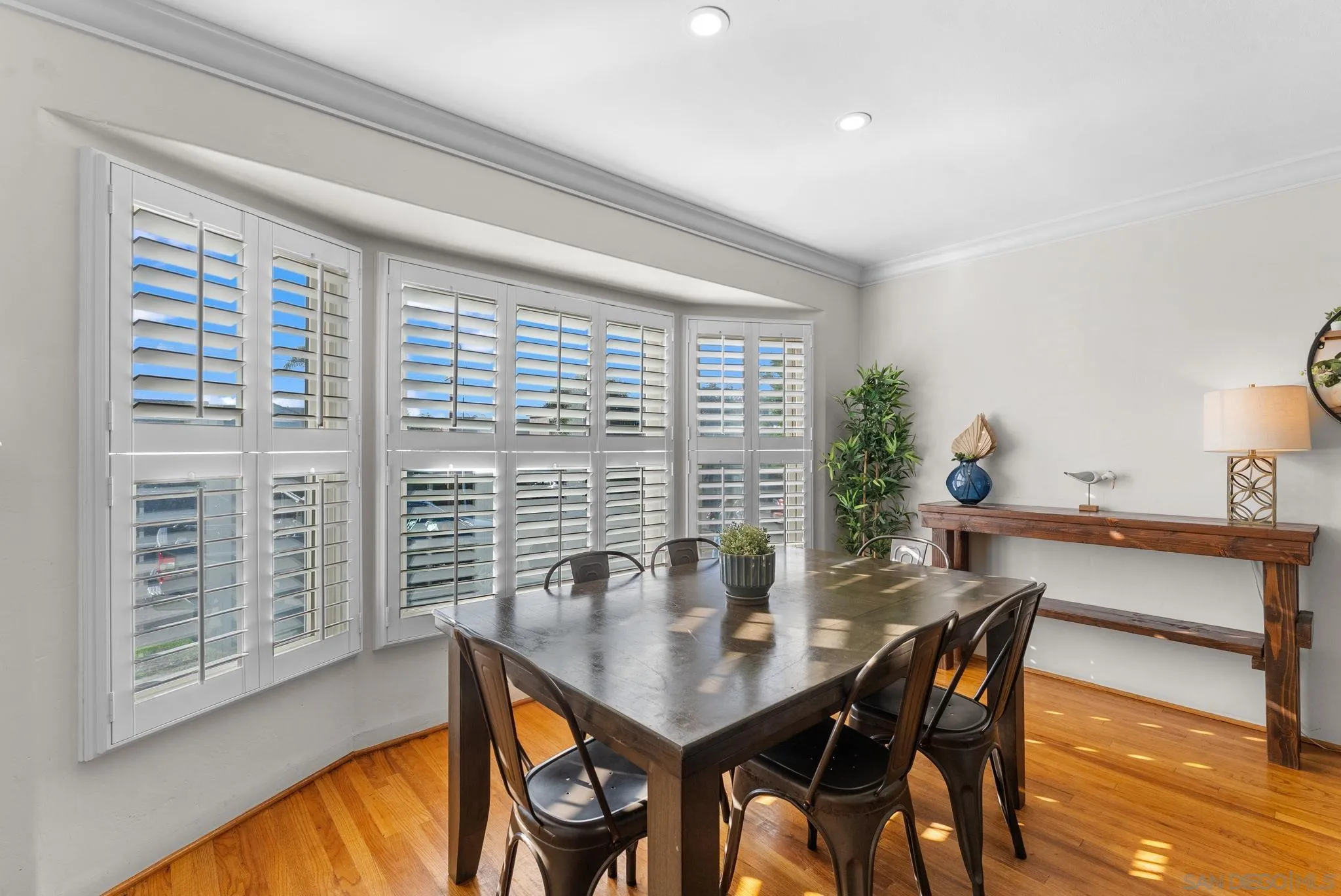 7005 Draper Avenue La Jolla, CA 92037 - Photo 4 of 26 a view of a dining room with furniture and window
