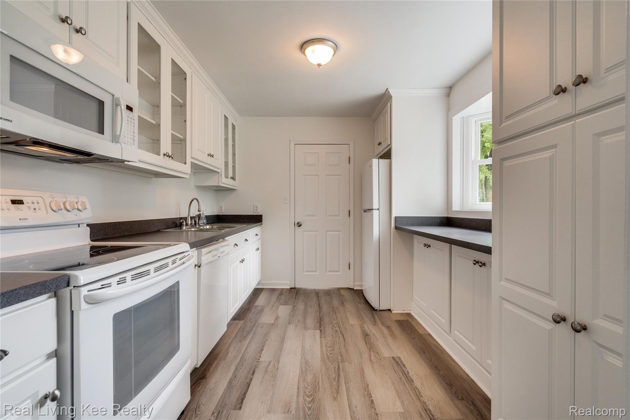 1928 Tamm Avenue Rochester, MI 48309 - Photo 11 of 41 Kitchen with Brand-New Vinyl Flooring