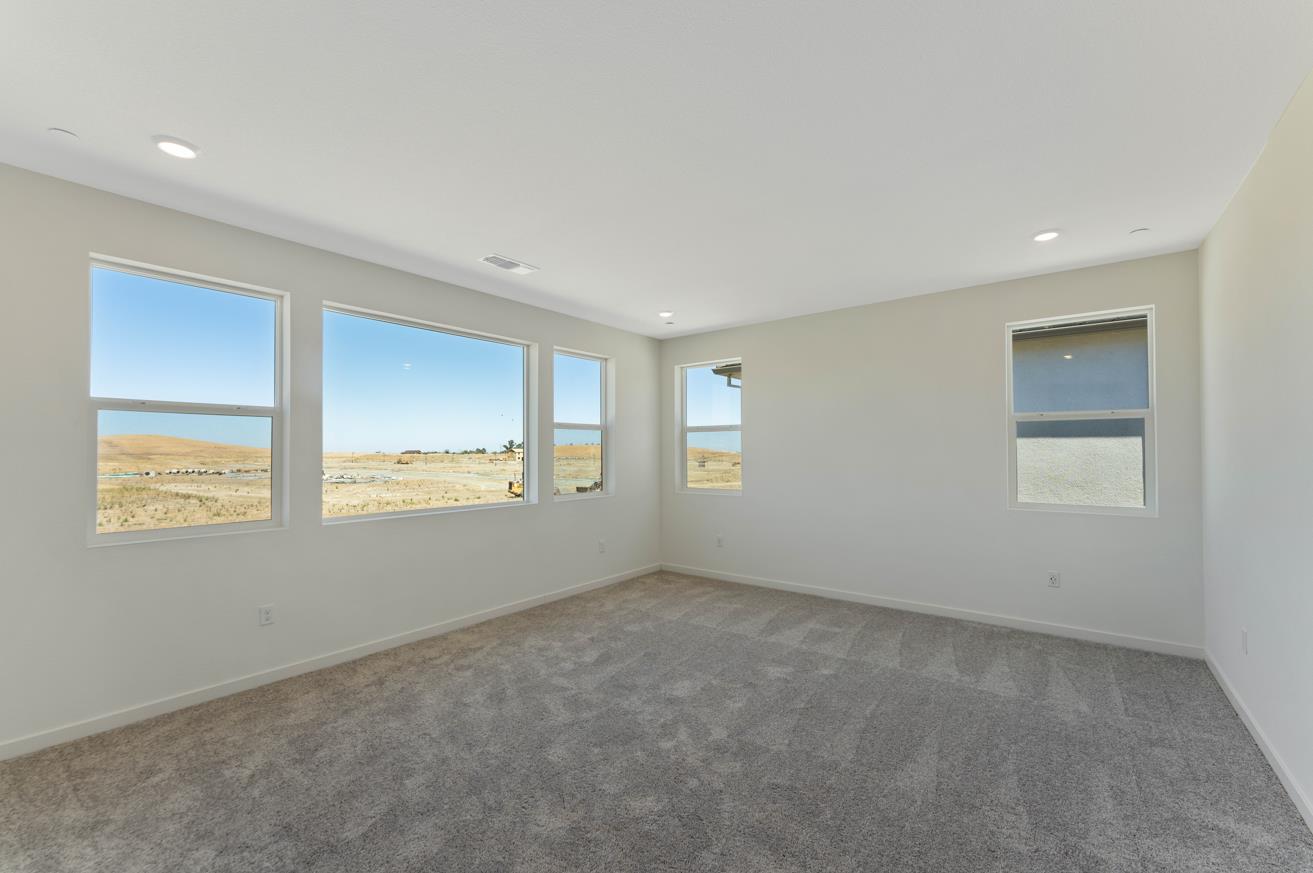 5956 Big Sky Drive Fairfield, CA 94533 - Photo 16 of 22 an empty room with windows