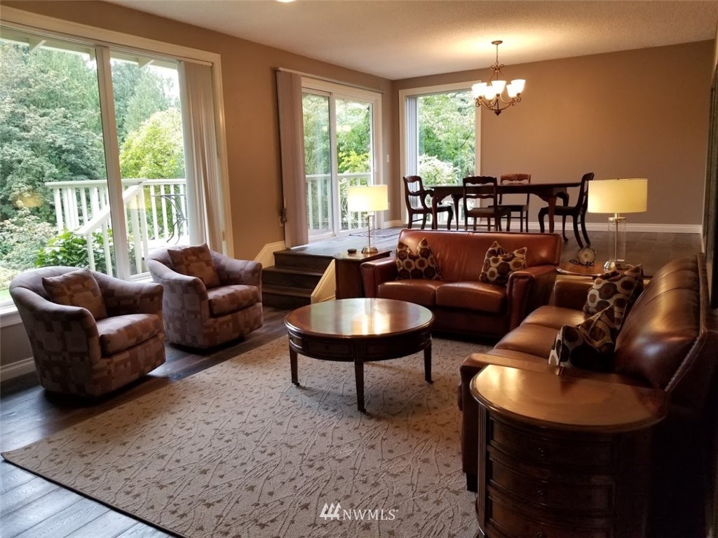 17023 154th Place Southeast Renton, WA 98058 - Photo 2 of 24 a living room with furniture and a large window