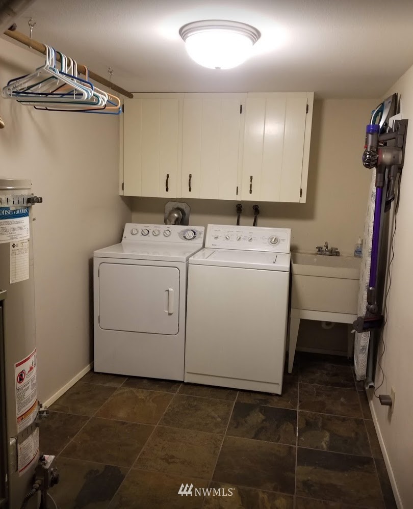 17023 154th Place Southeast Renton, WA 98058 - Photo 20 of 24 a utility room with dryer and washer