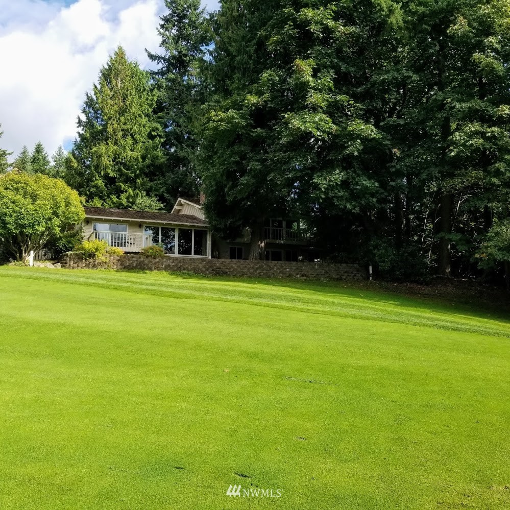 17023 154th Place Southeast Renton, WA 98058 - Photo 23 of 24 a view of a house with a big yard