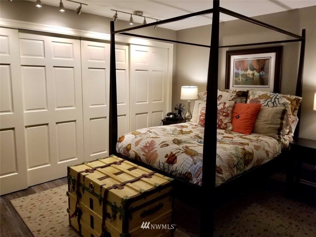 17023 154th Place Southeast Renton, WA 98058 - Photo 10 of 24 a bedroom with a bed and a mirror
