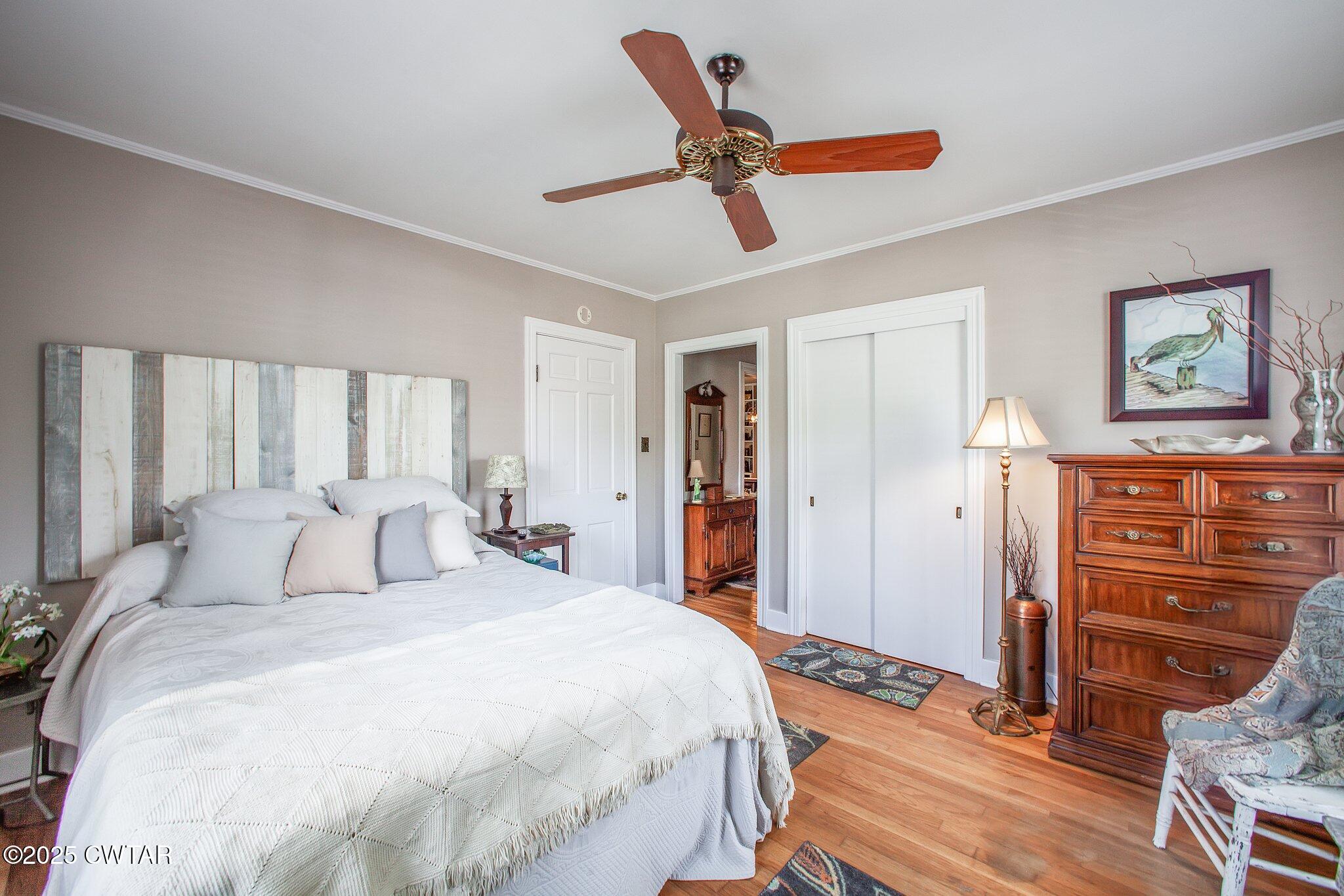 302 Walnut Street Jackson, TN 38301 - Photo 21 of 38 a bedroom with a bed and closet