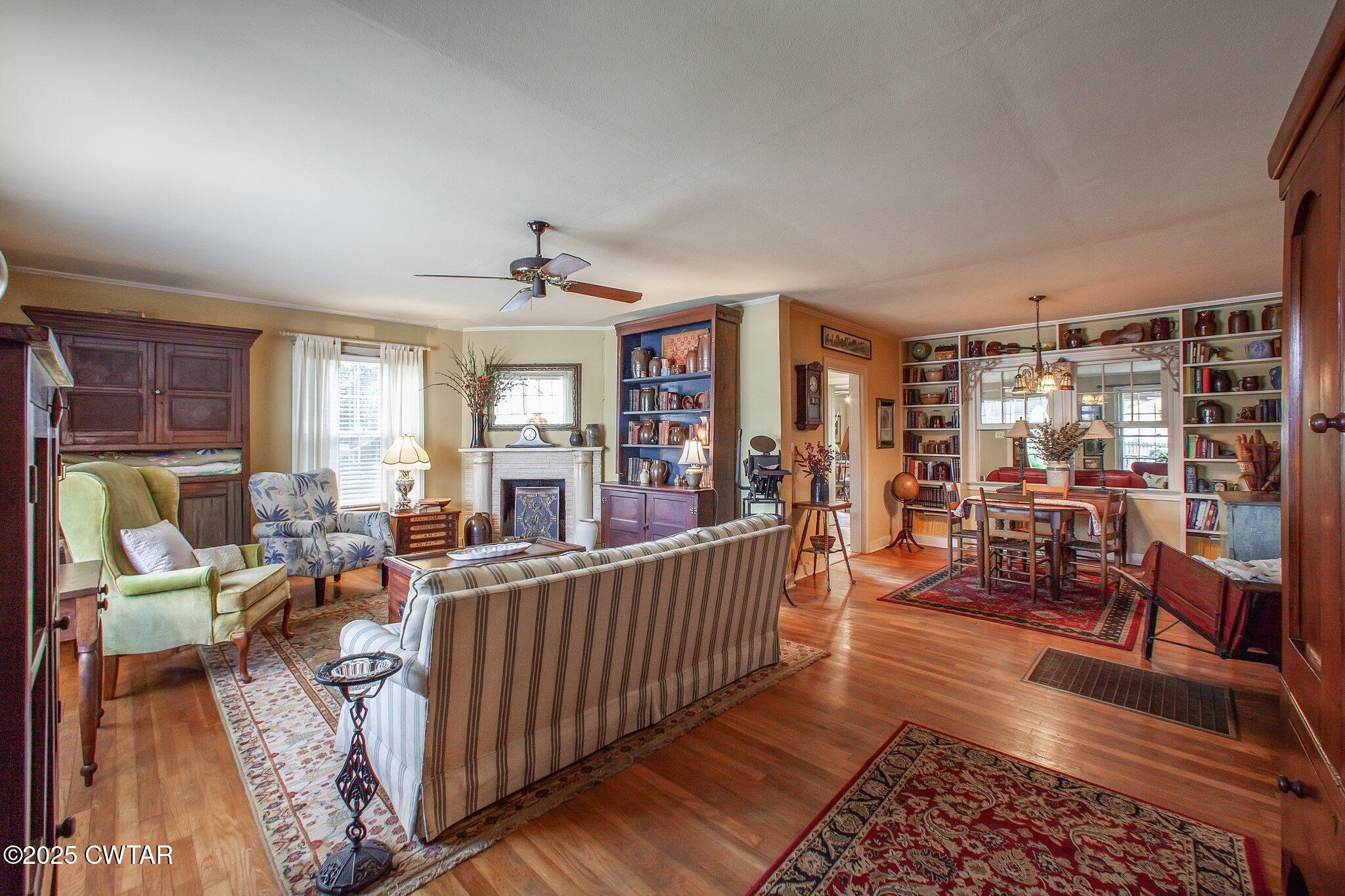 302 Walnut Street Jackson, TN 38301 - Photo 24 of 38 a living room with furniture and wooden floor