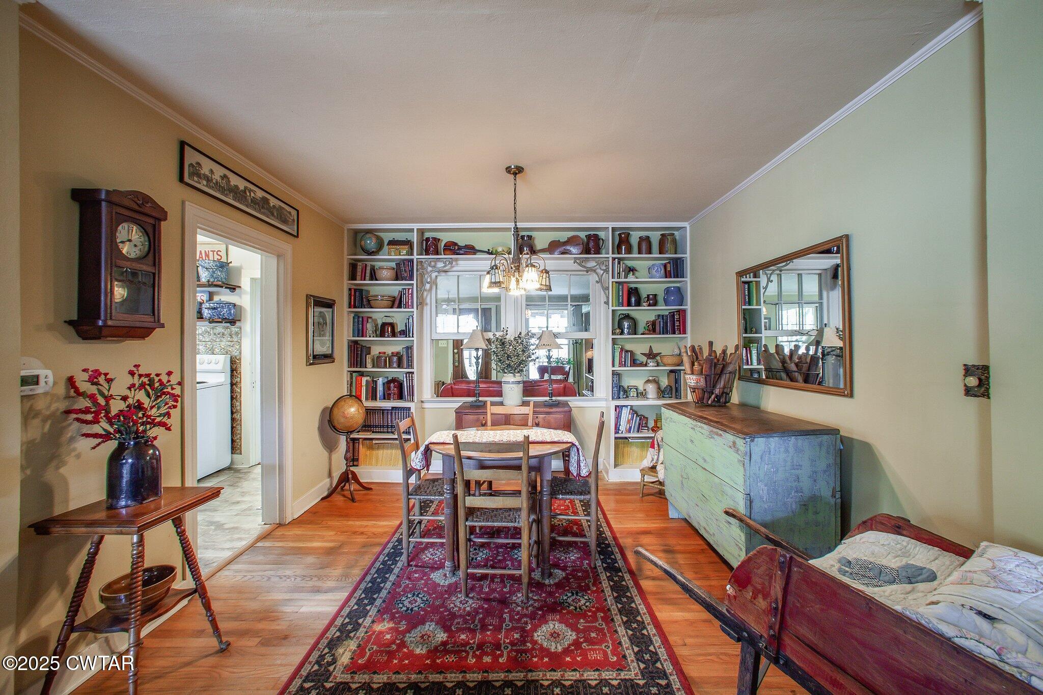 302 Walnut Street Jackson, TN 38301 - Photo 27 of 38 a living room with furniture and wooden floor