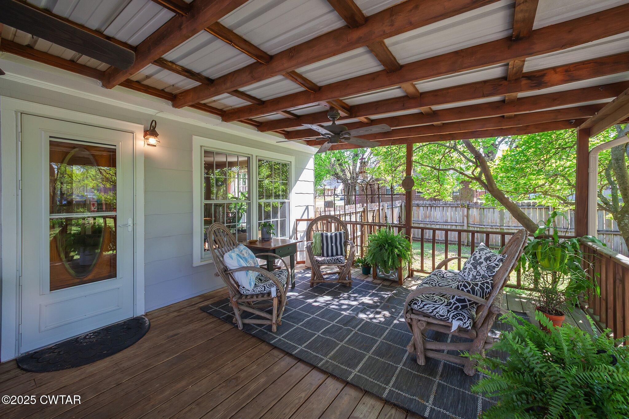 302 Walnut Street Jackson, TN 38301 - Photo 29 of 38 a view of a backyard with sitting area and furniture