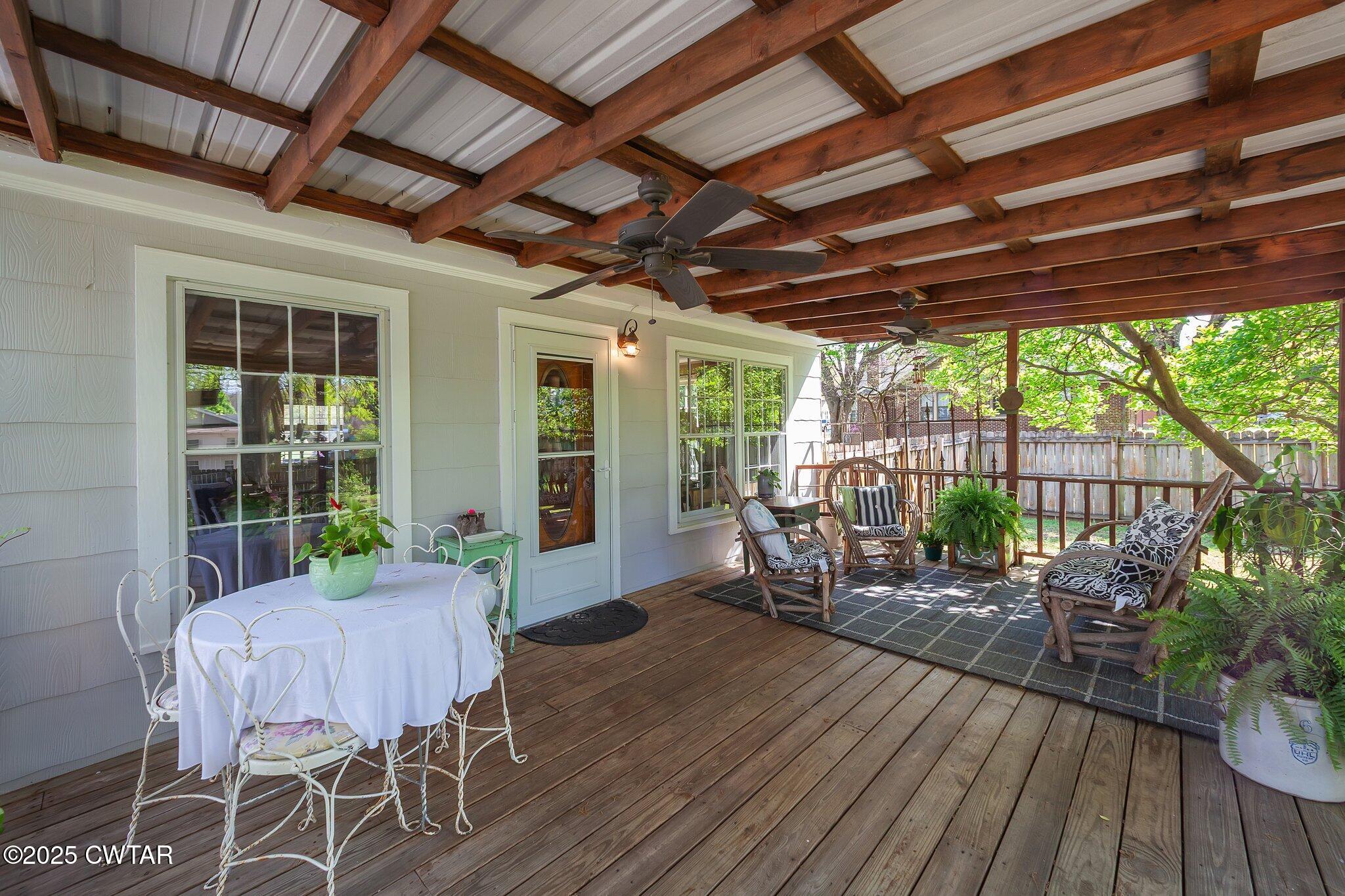 302 Walnut Street Jackson, TN 38301 - Photo 31 of 38 a patio with patio lots of furniture and wooden floor