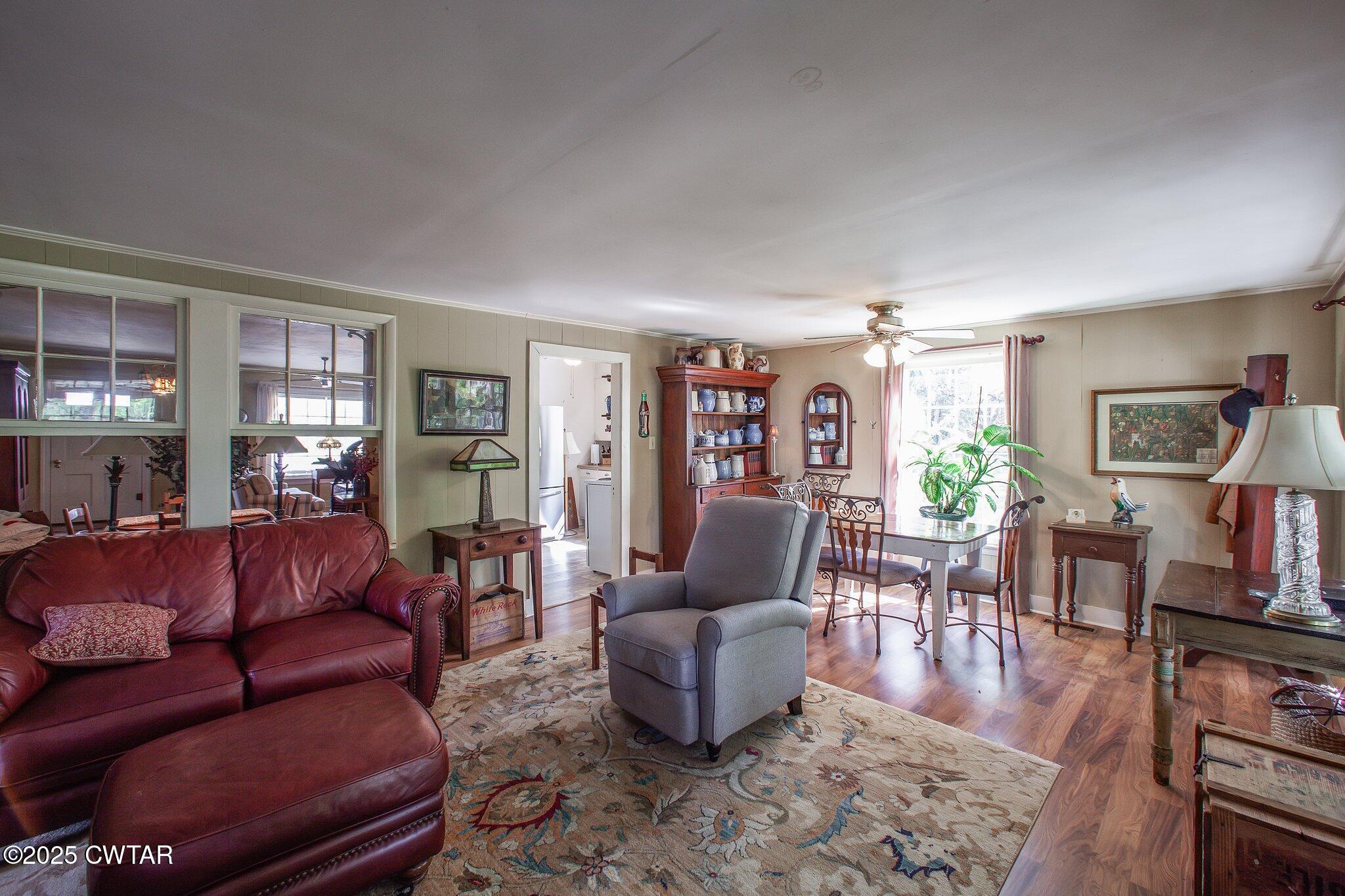 302 Walnut Street Jackson, TN 38301 - Photo 6 of 38 a living room with furniture and a wooden floor