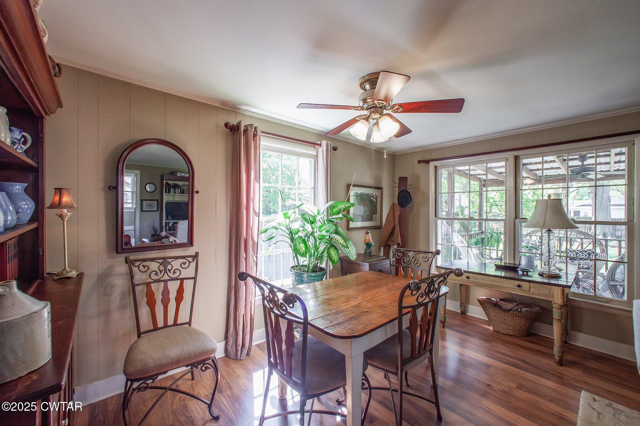 302 Walnut Street Jackson, TN 38301 - Photo 8 of 38 a view of a livingroom with furniture window and wooden floor