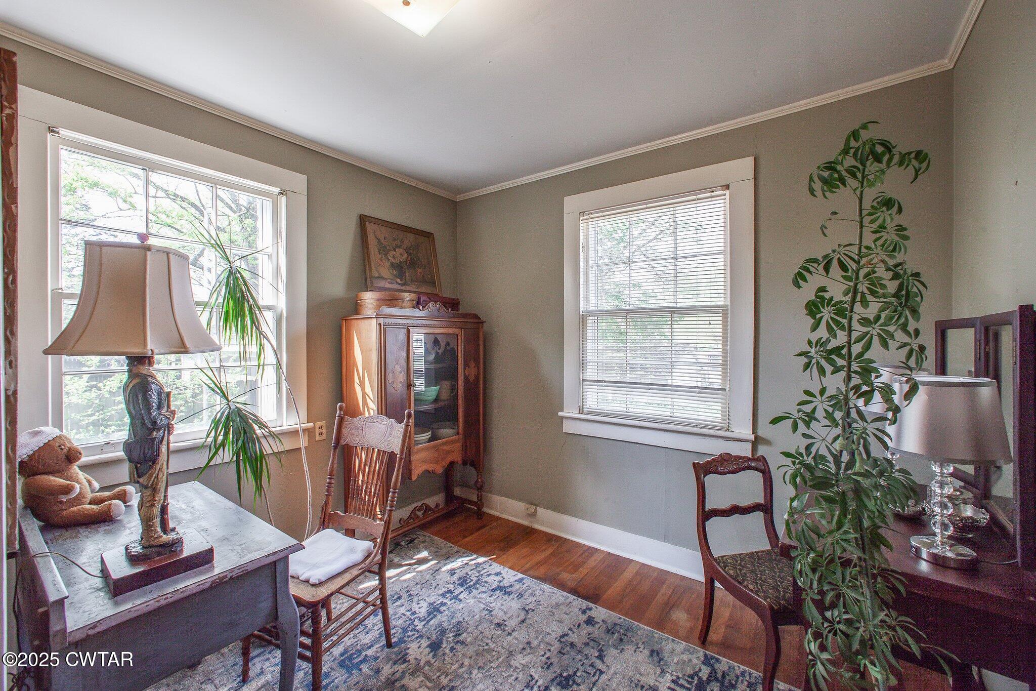302 Walnut Street Jackson, TN 38301 - Photo 10 of 38 a living room with furniture and a window