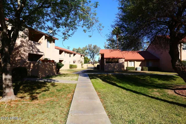 a view of swimming pool with a yard
