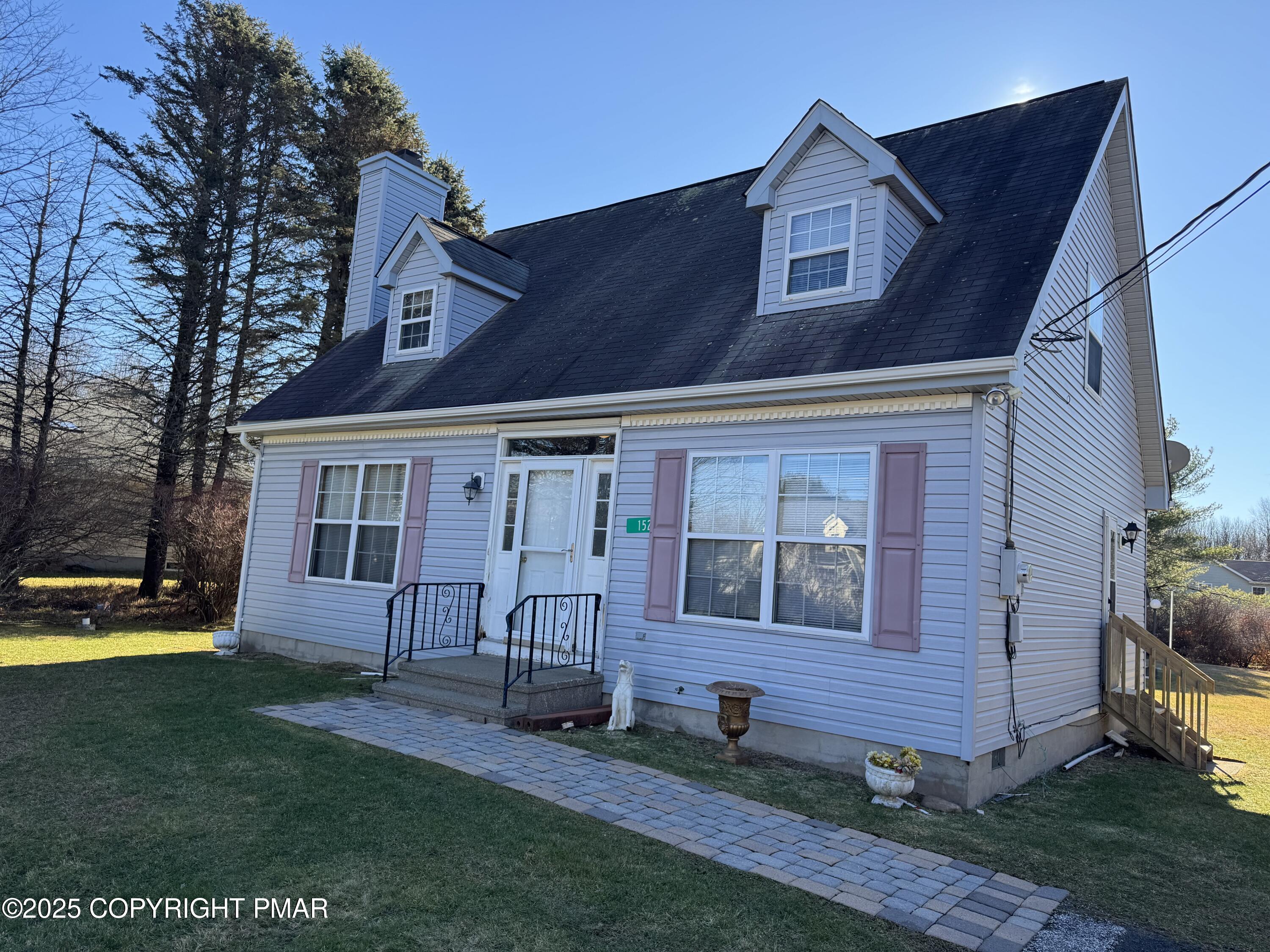 152 Bull Run Long Pond, PA 18334 - Photo 2 of 58 a view of front of a house with a yard