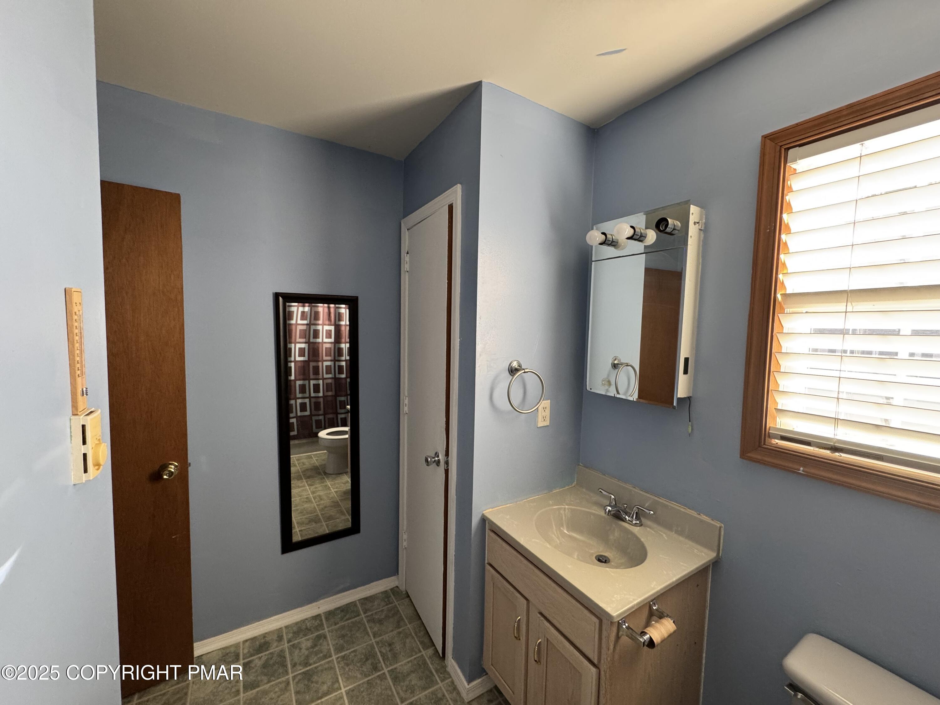 152 Bull Run Long Pond, PA 18334 - Photo 24 of 58 a bathroom with a sink a toilet and shower