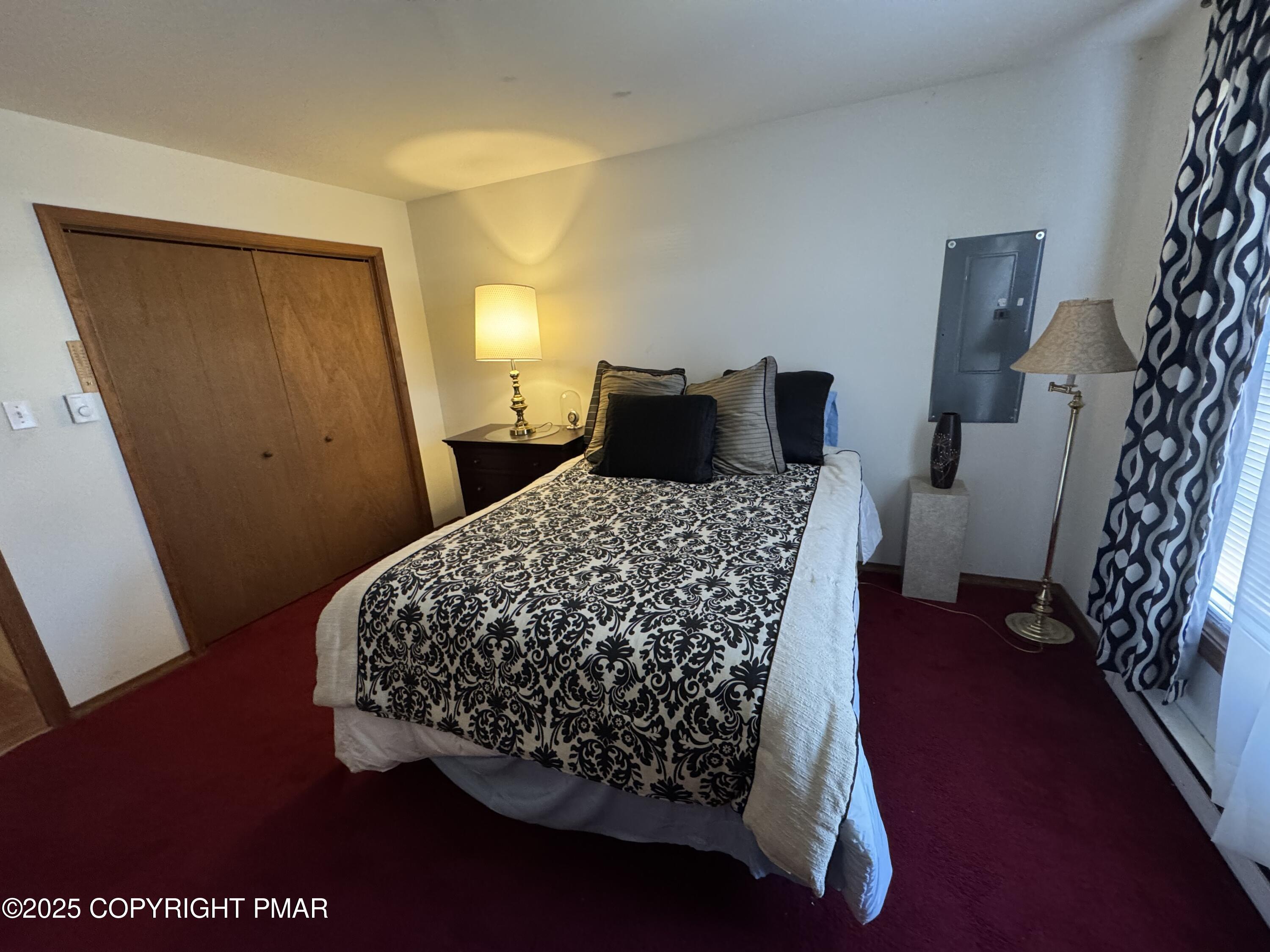 152 Bull Run Long Pond, PA 18334 - Photo 27 of 58 a bed sitting in a bedroom next to a window