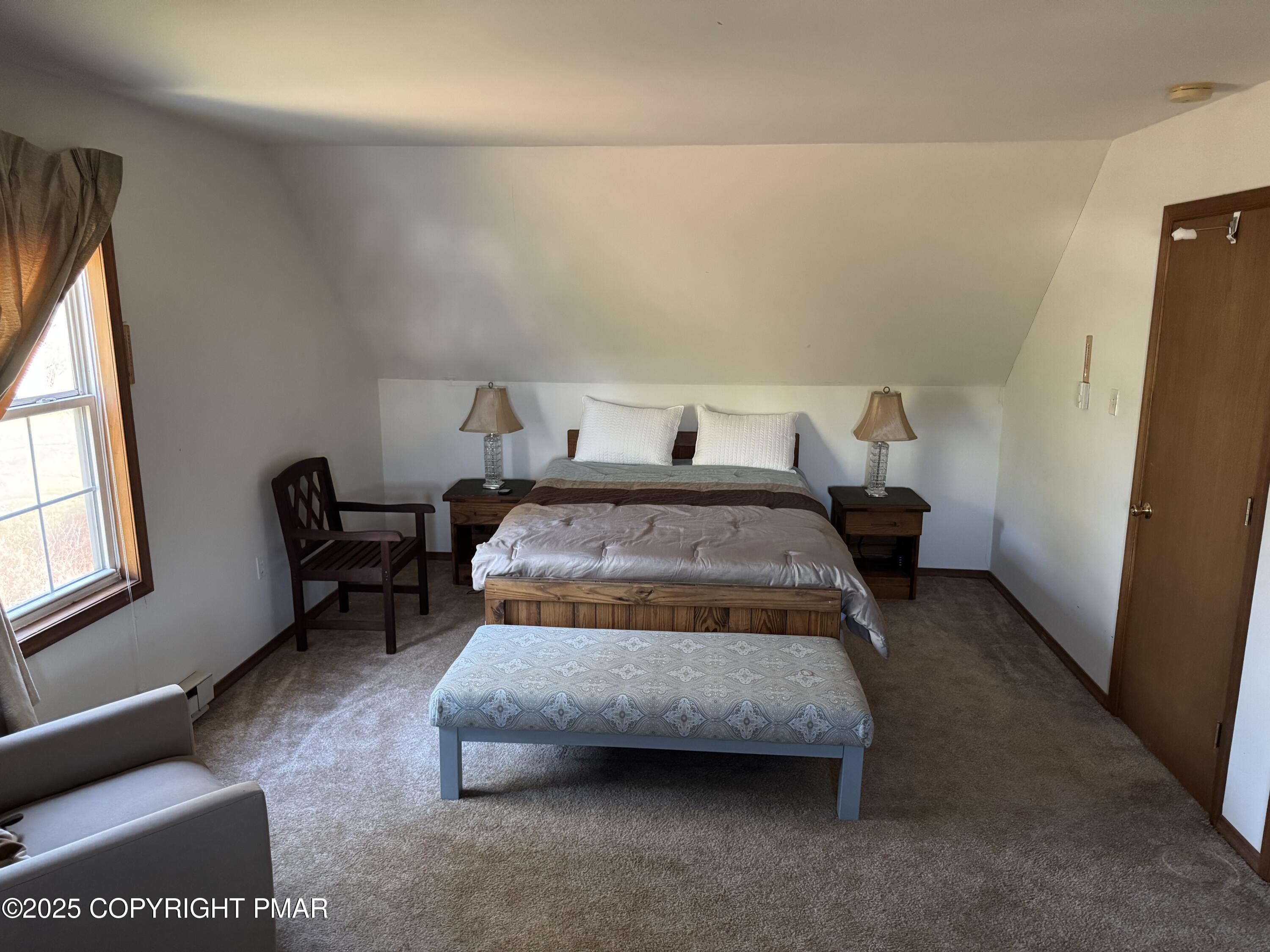 152 Bull Run Long Pond, PA 18334 - Photo 29 of 58 a bedroom with furniture and a window