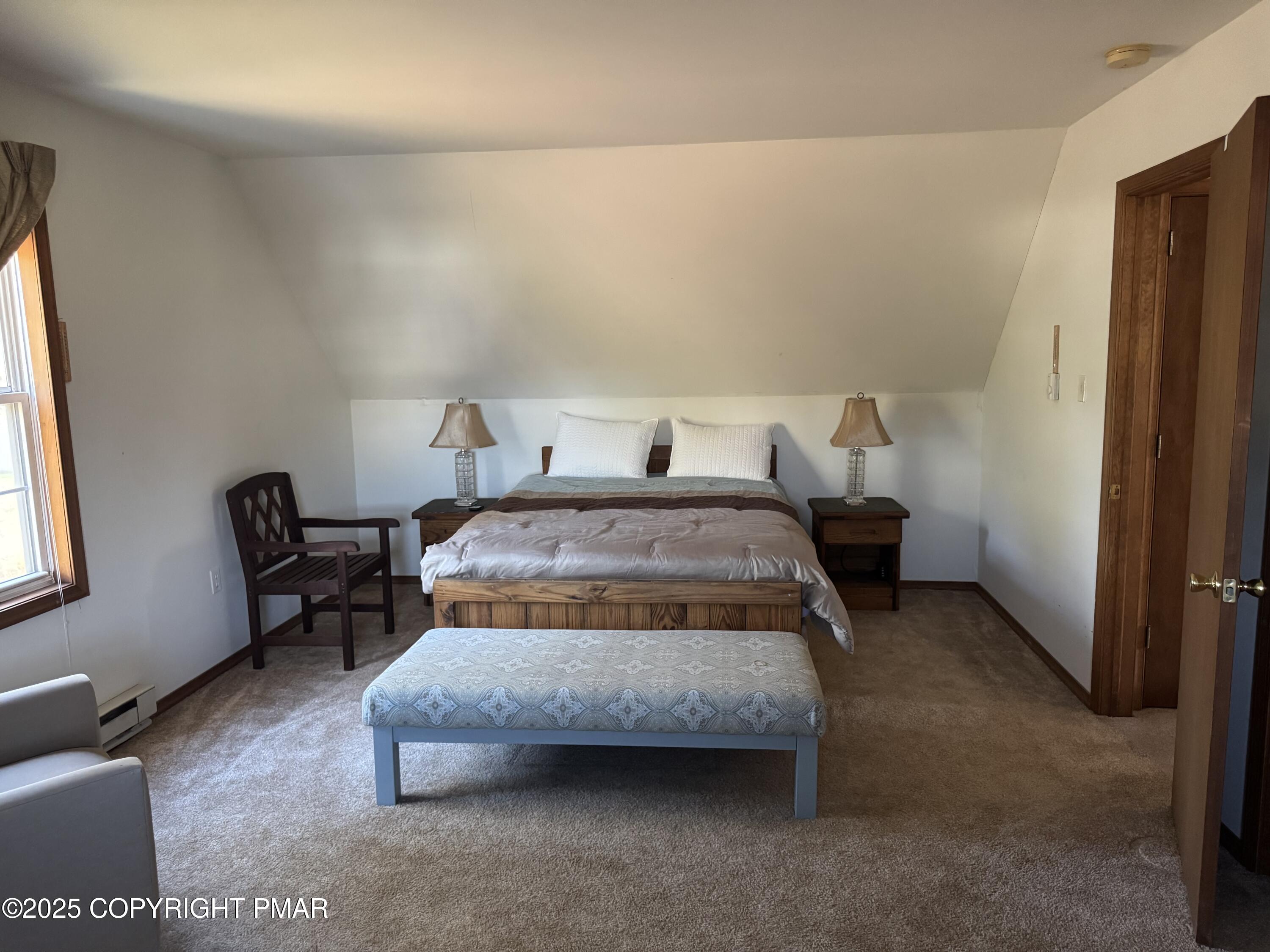 152 Bull Run Long Pond, PA 18334 - Photo 30 of 58 a bedroom with furniture and a window