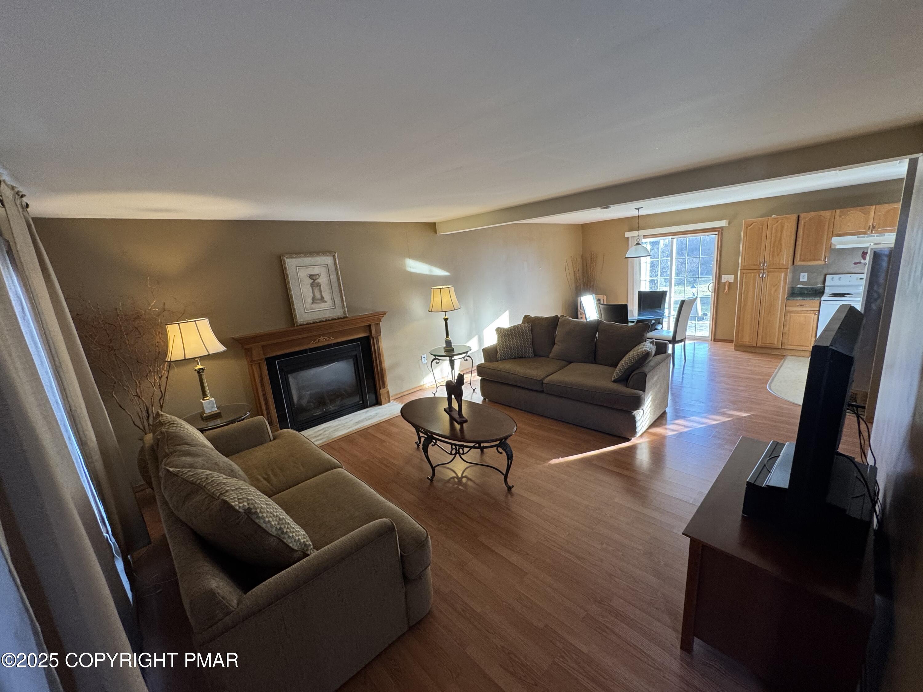 152 Bull Run Long Pond, PA 18334 - Photo 3 of 58 a living room with furniture and a fireplace