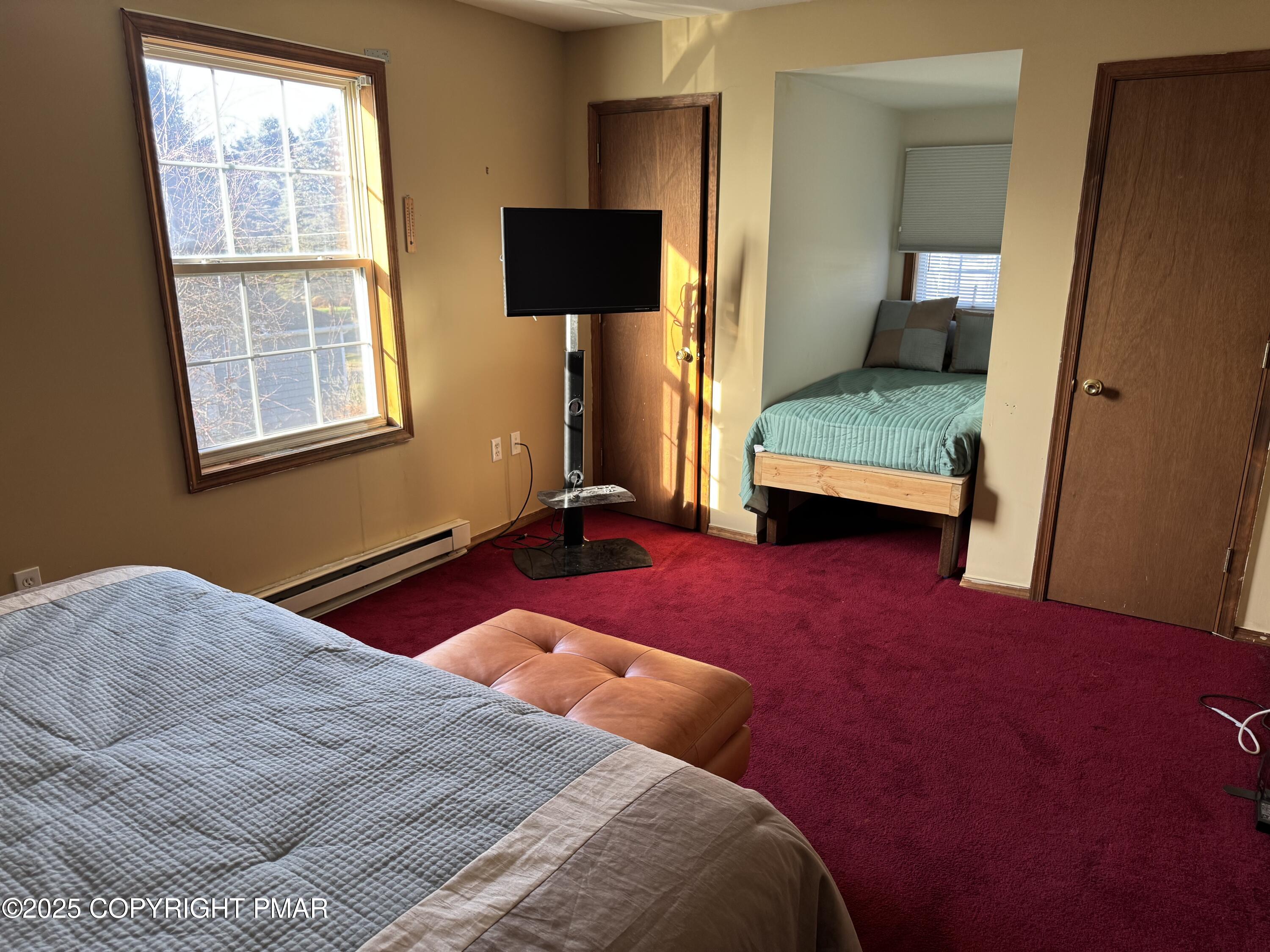 152 Bull Run Long Pond, PA 18334 - Photo 40 of 58 a bedroom with a bed and a window