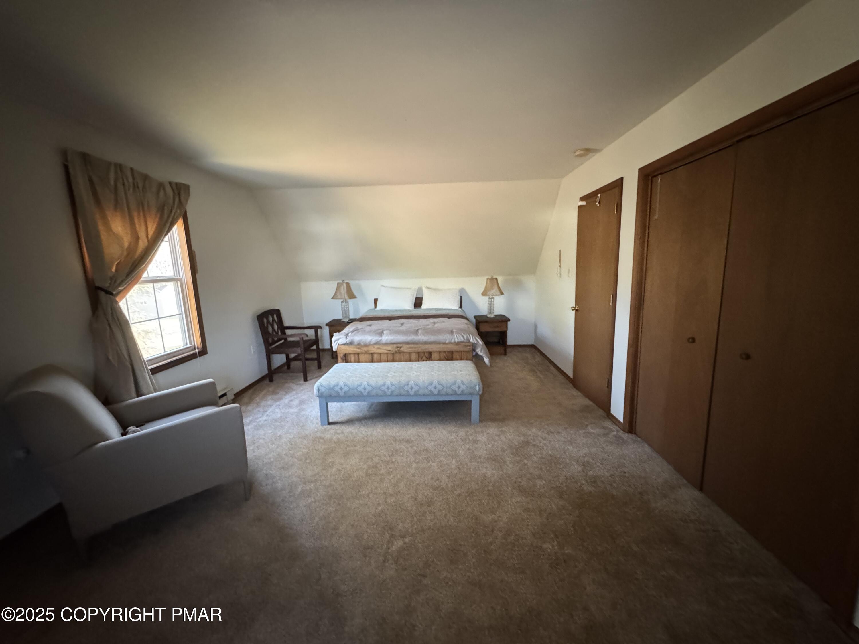 152 Bull Run Long Pond, PA 18334 - Photo 48 of 58 a bed room with a bed and a couch