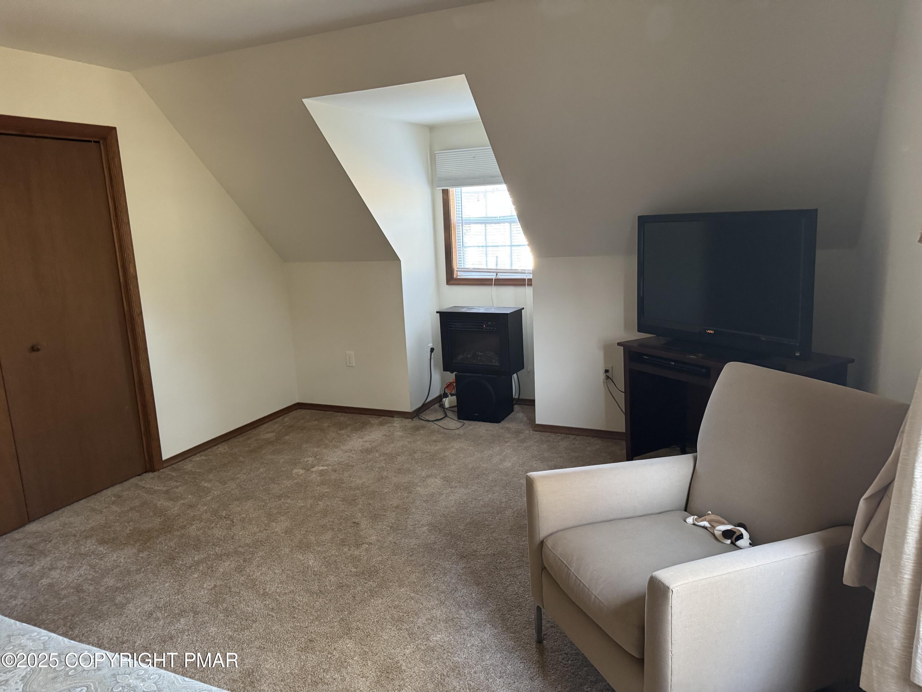 152 Bull Run Long Pond, PA 18334 - Photo 49 of 58 a living room with furniture and a window
