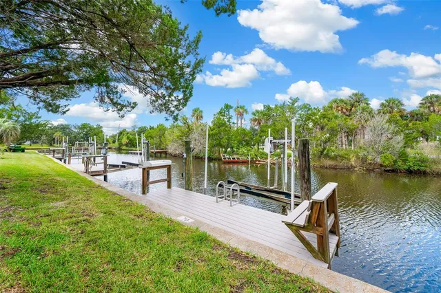 a view of a table and chairs on the roof deck