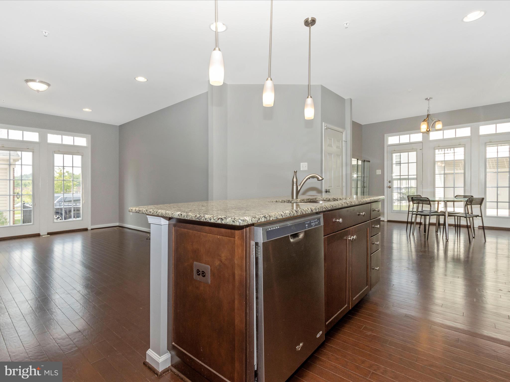 7208 Maisson Ridge Circle Beltsville, MD 20705 - Photo 16 of 53 a kitchen with center island table and chairs