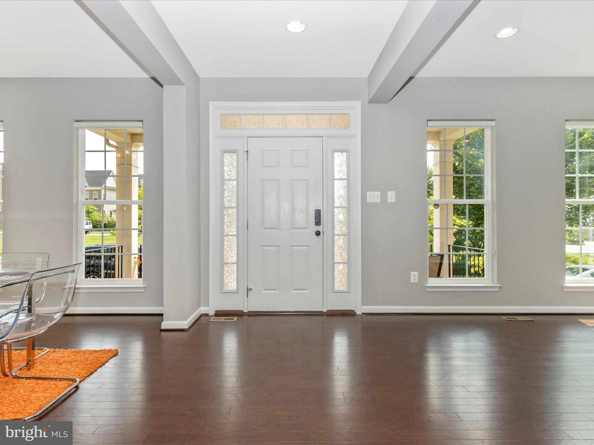 7208 Maisson Ridge Circle Beltsville, MD 20705 - Photo 2 of 53 an empty room with wooden floor and windows