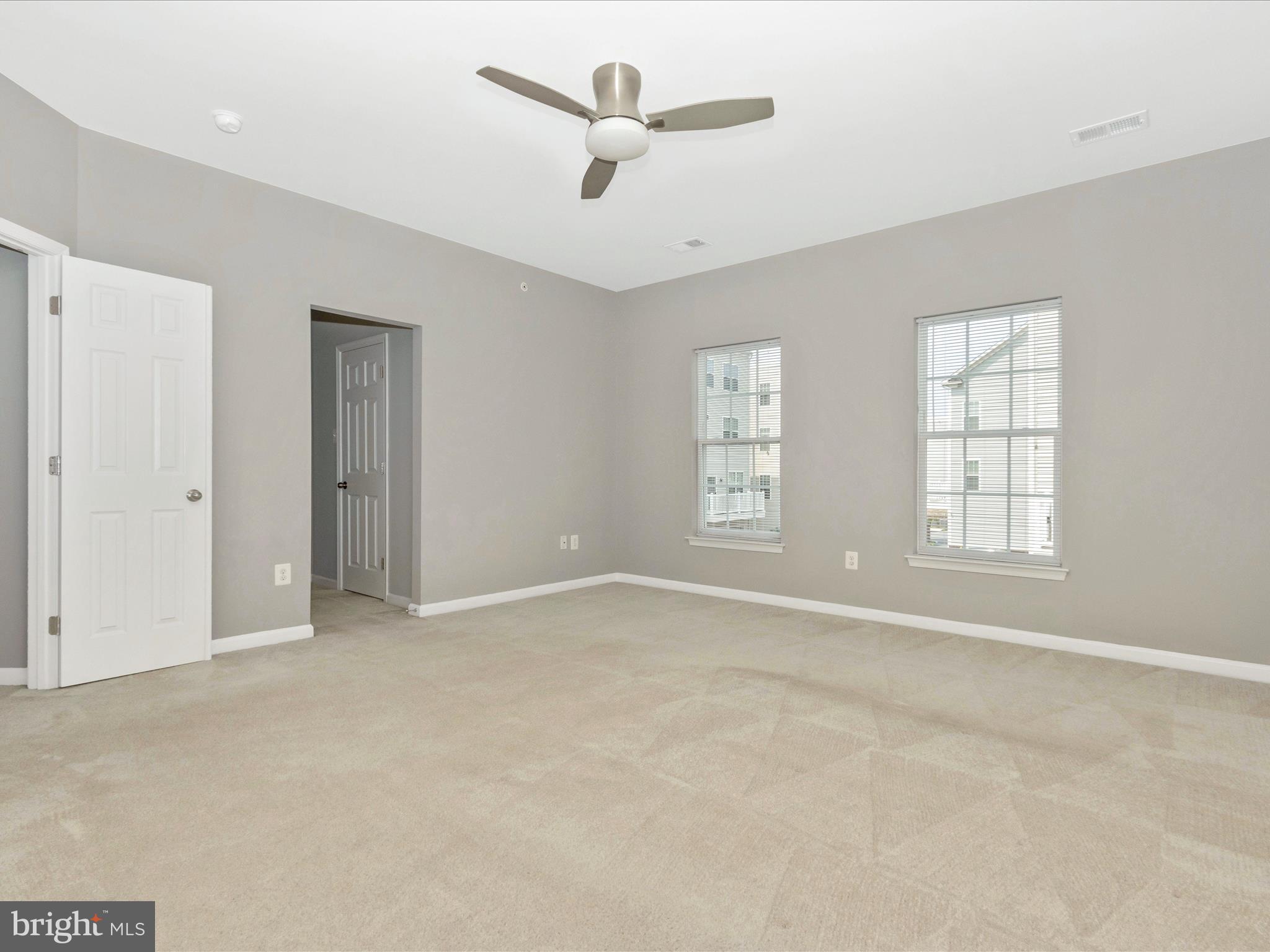 7208 Maisson Ridge Circle Beltsville, MD 20705 - Photo 22 of 53 a view of an empty room with a window