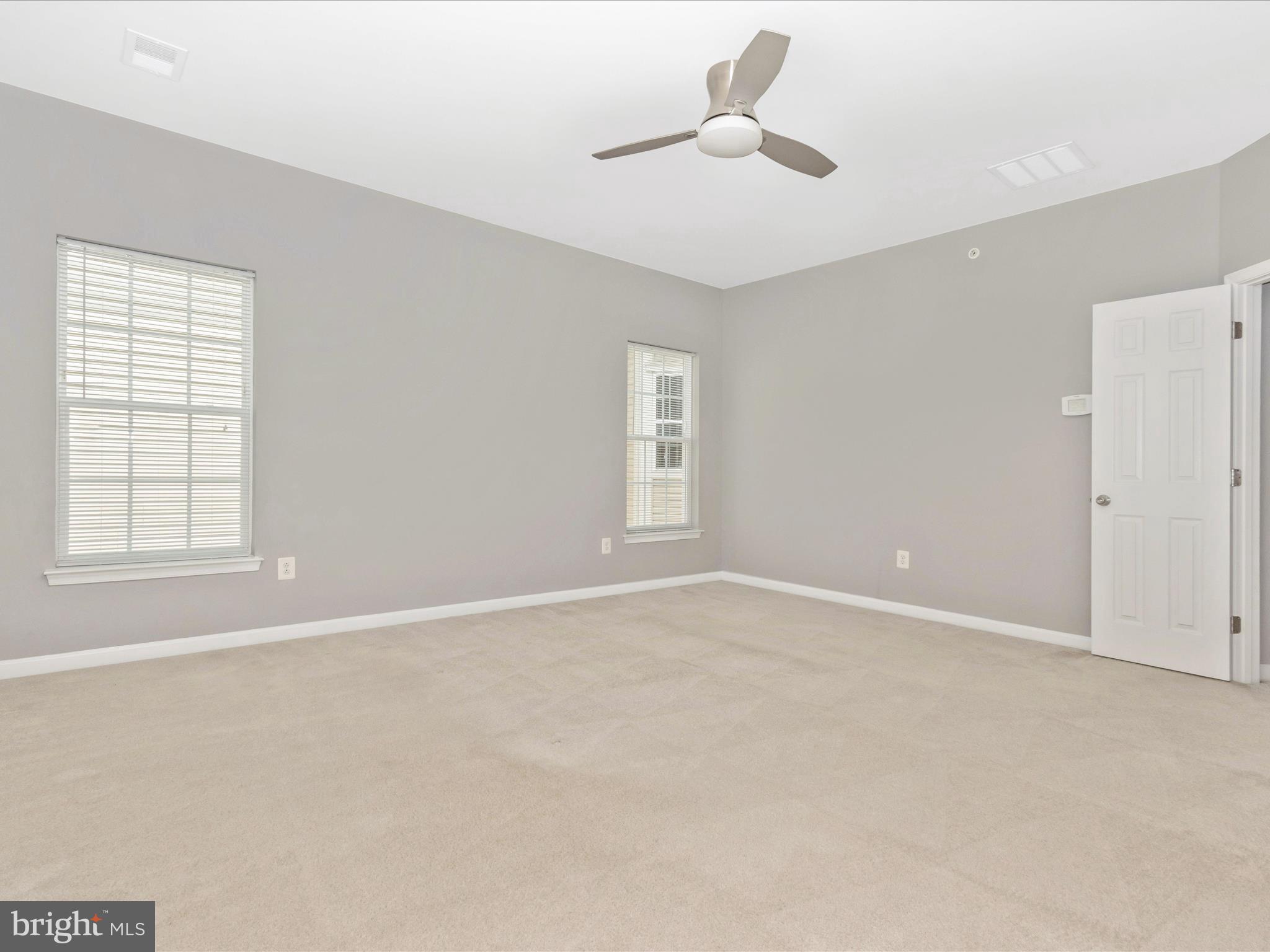 7208 Maisson Ridge Circle Beltsville, MD 20705 - Photo 23 of 53 a view of an empty room with a window