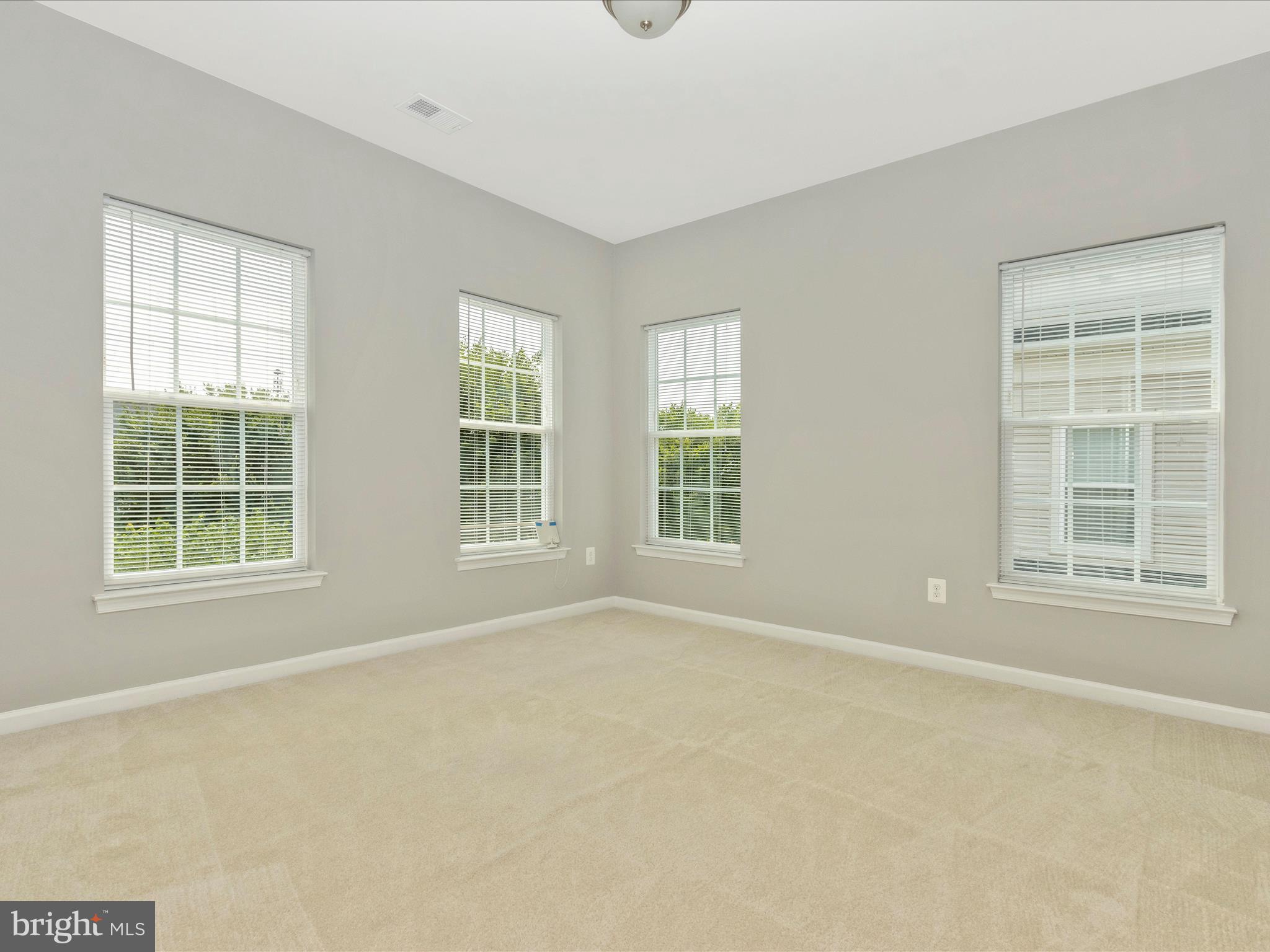 7208 Maisson Ridge Circle Beltsville, MD 20705 - Photo 28 of 53 an empty room with a window