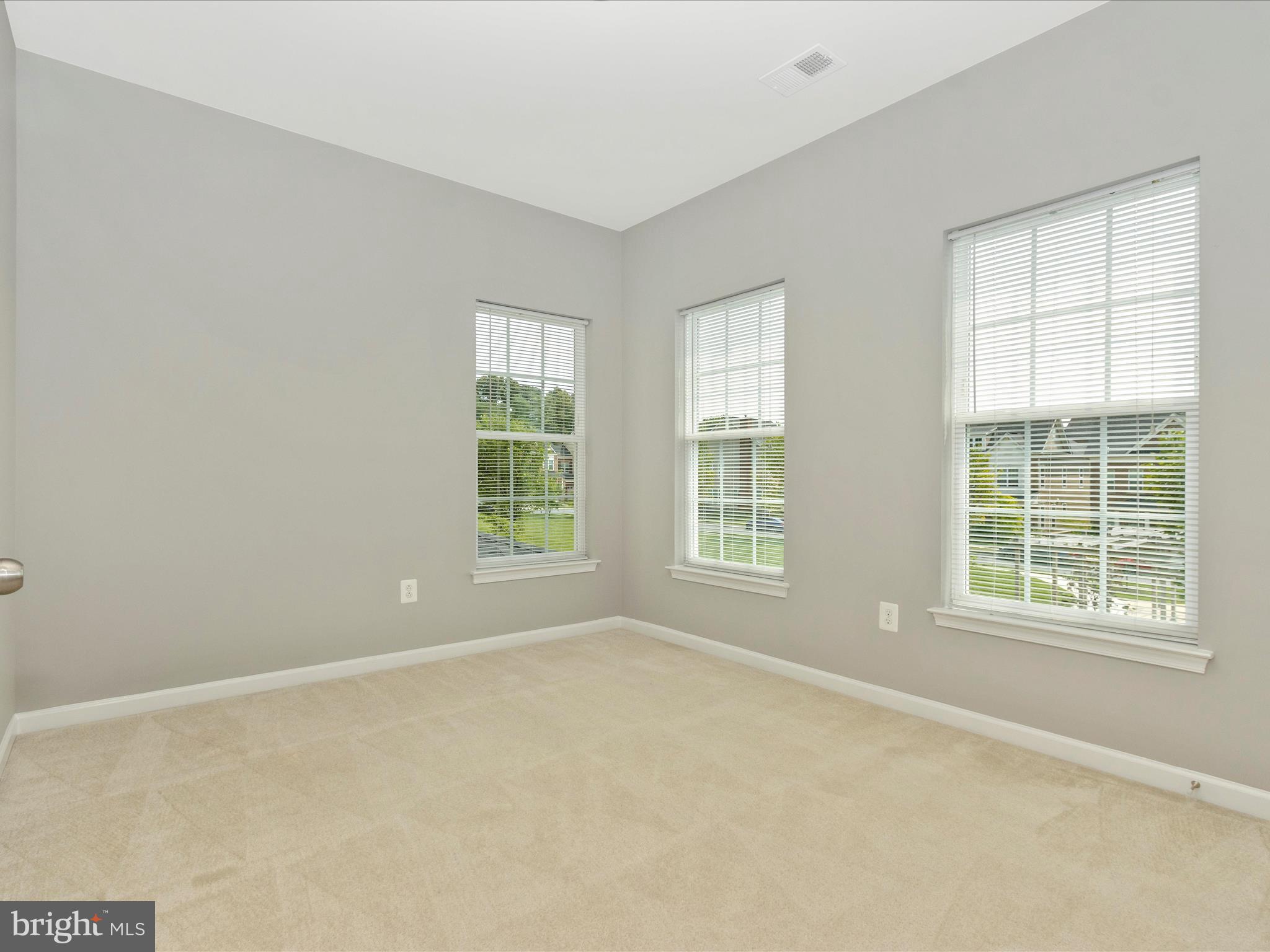 7208 Maisson Ridge Circle Beltsville, MD 20705 - Photo 29 of 53 an empty room with windows