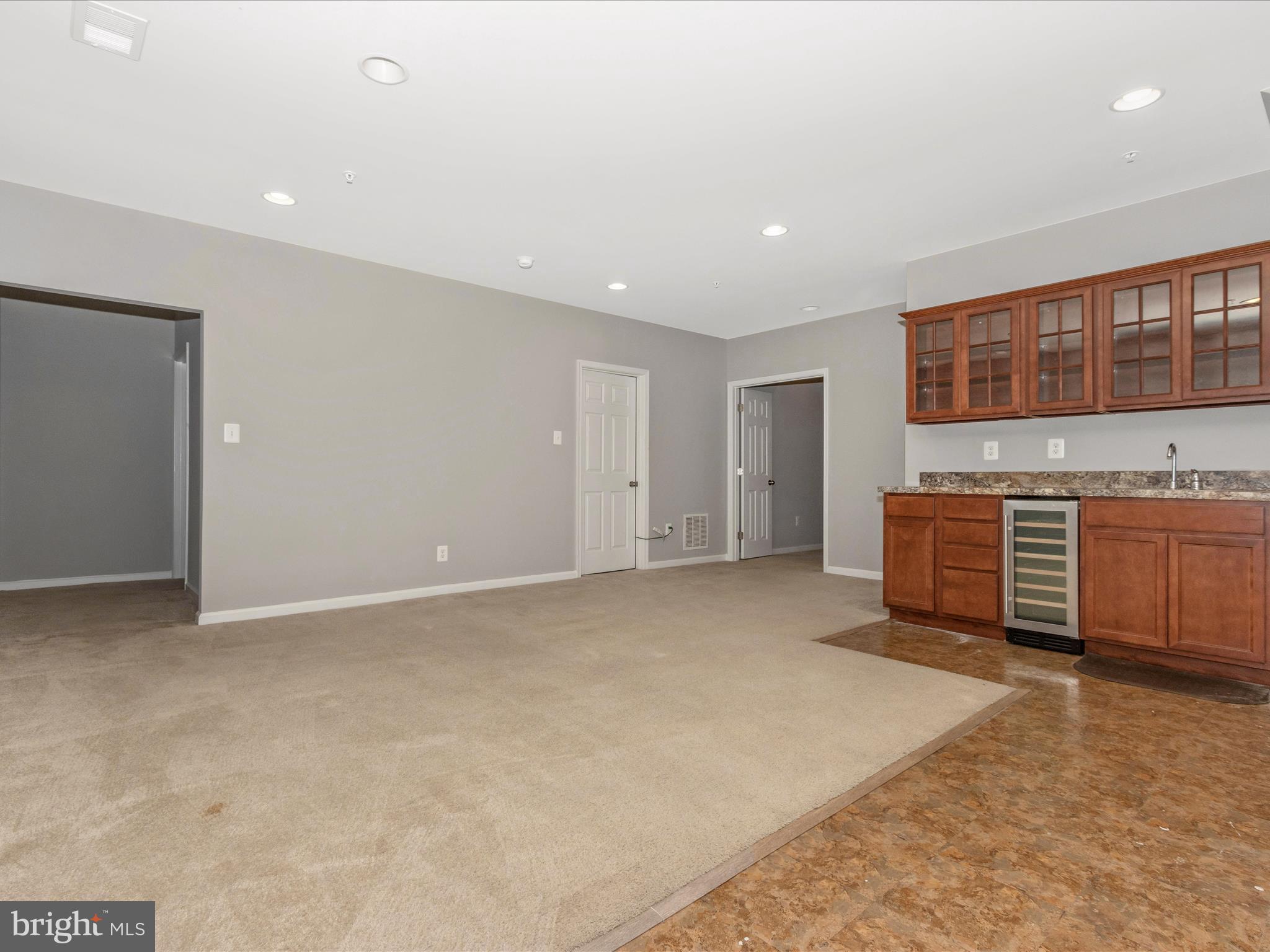 7208 Maisson Ridge Circle Beltsville, MD 20705 - Photo 35 of 53 a view of an empty room with a fireplace