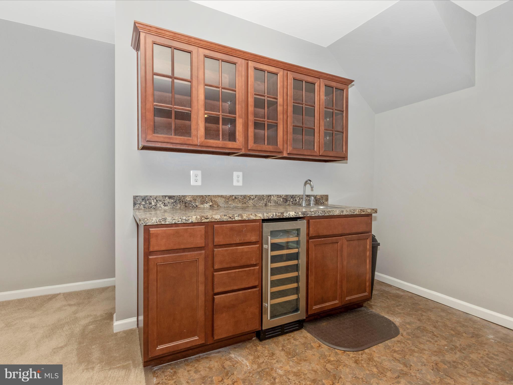 7208 Maisson Ridge Circle Beltsville, MD 20705 - Photo 36 of 53 a room with granite countertop cabinets and sink