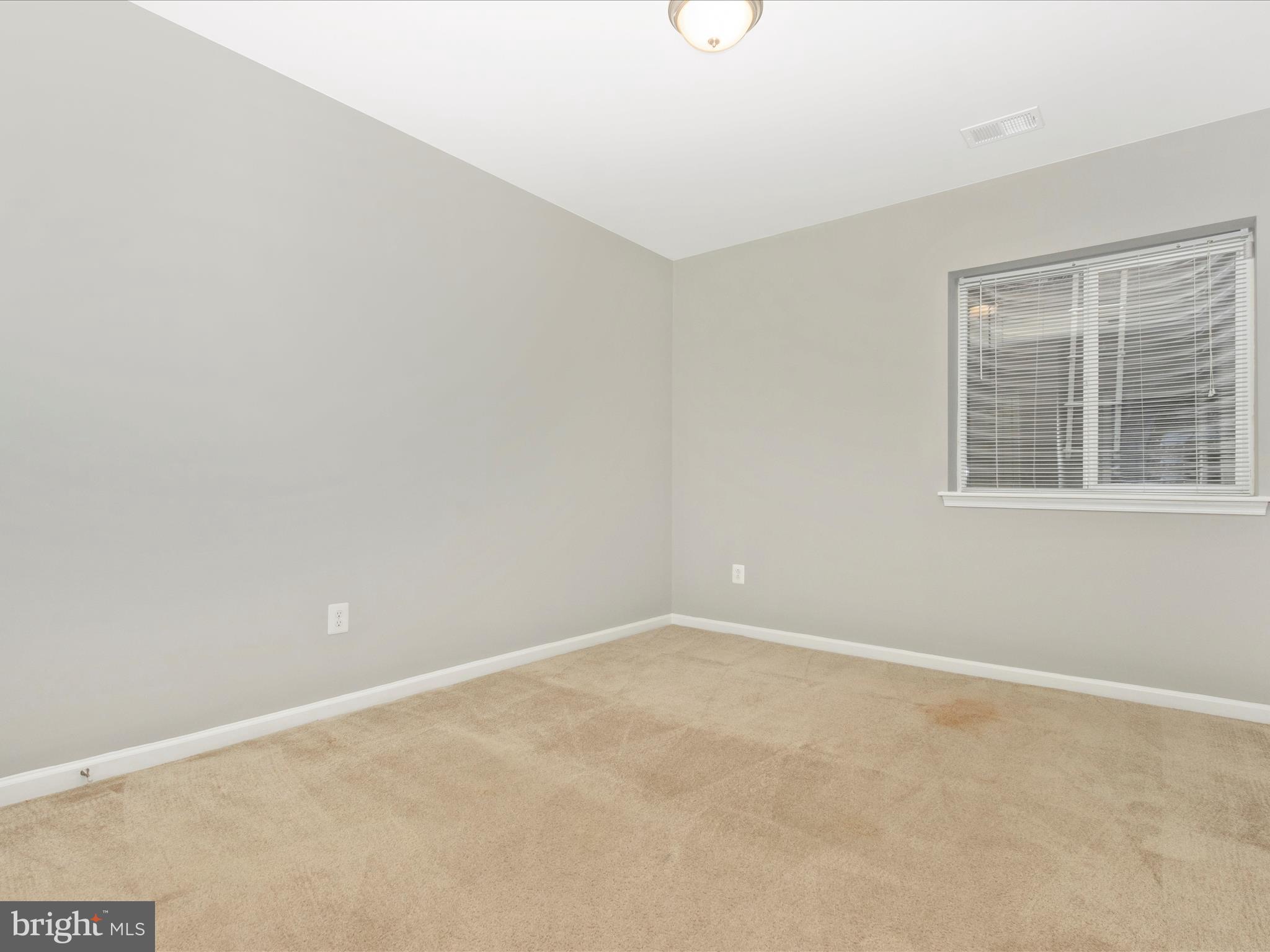 7208 Maisson Ridge Circle Beltsville, MD 20705 - Photo 38 of 53 an empty room with windows