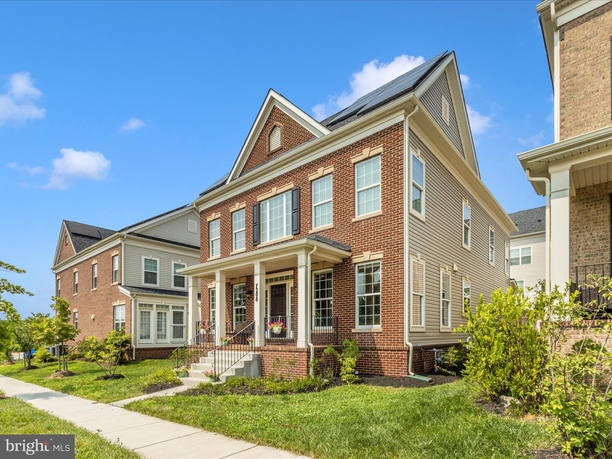 7208 Maisson Ridge Circle Beltsville, MD 20705 - Photo 41 of 53 front view of a house with a yard