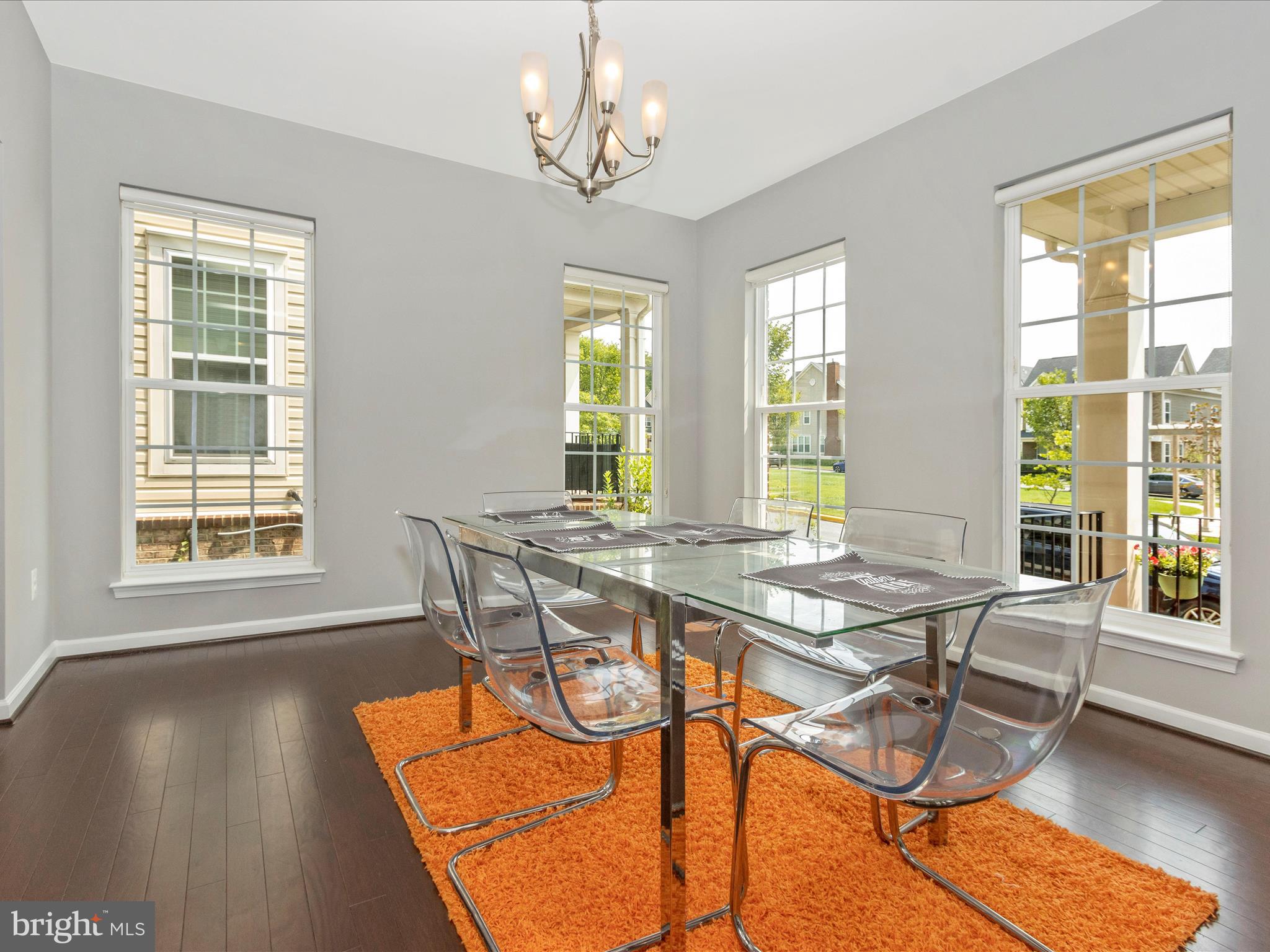 7208 Maisson Ridge Circle Beltsville, MD 20705 - Photo 6 of 53 a view of a dining room with furniture and windows