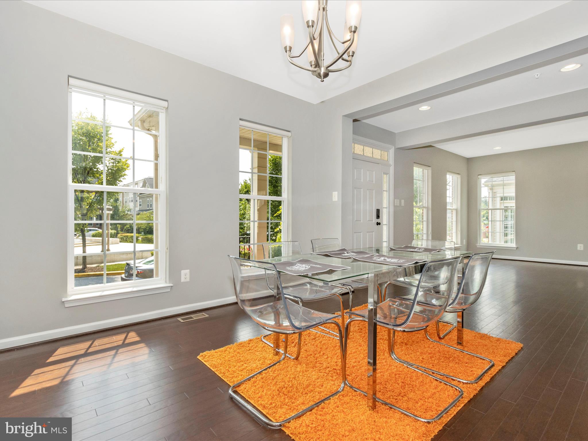7208 Maisson Ridge Circle Beltsville, MD 20705 - Photo 7 of 53 a view of a dining room with furniture window and wooden floor