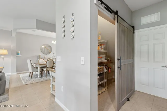 a bedroom with a bed and a table in it