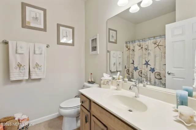 a front view of house with yard and entertaining space