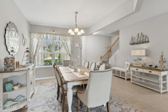 a bedroom with a bed a book shelf and a window