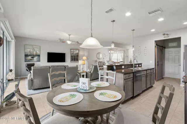 a view of a lake with houses in the back