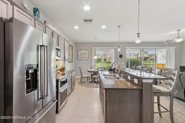a living room with furniture and a toilet